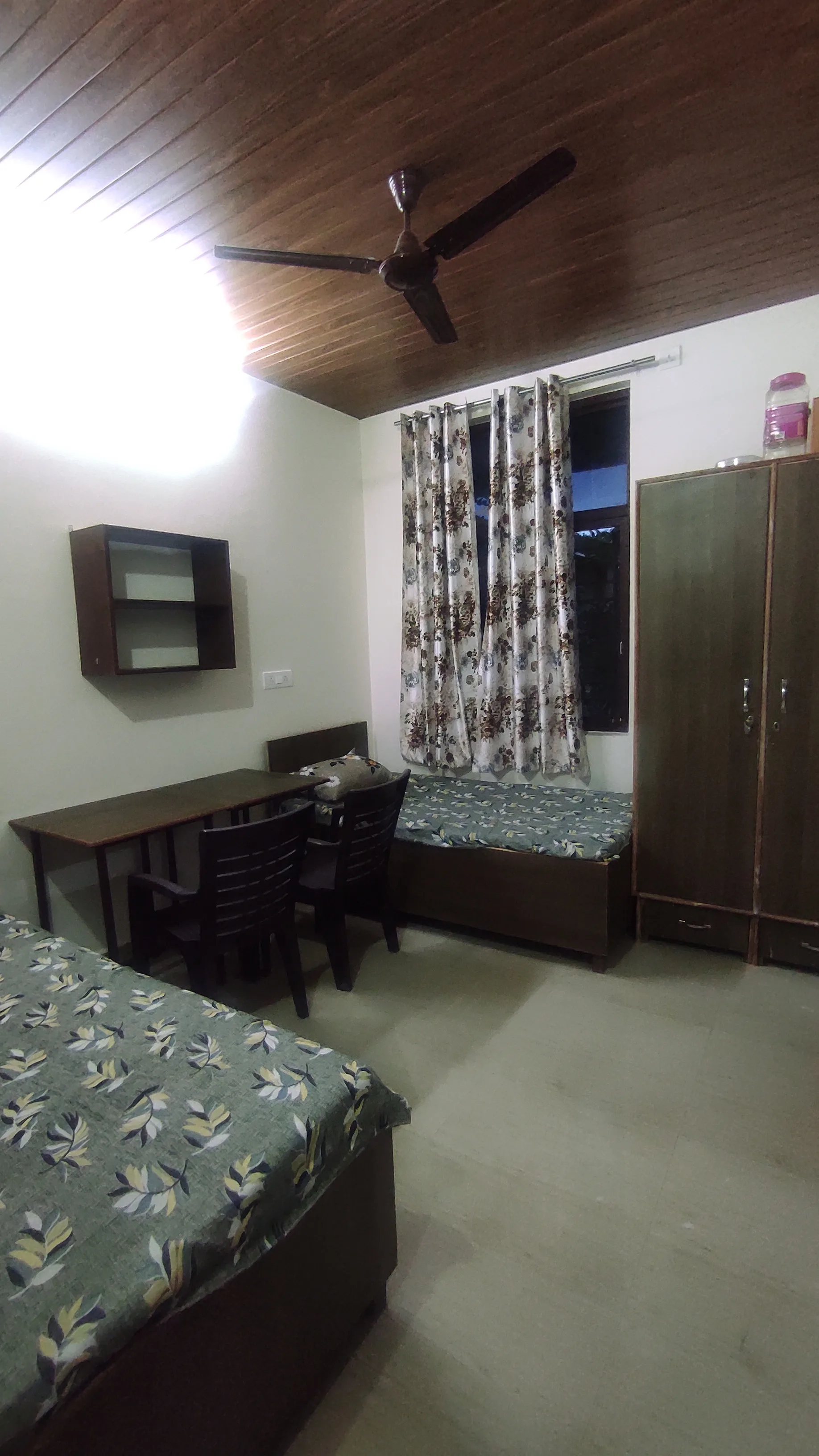 Elegant room with almirah and study chair at Daksh Home boys hostel UPES Kandoli