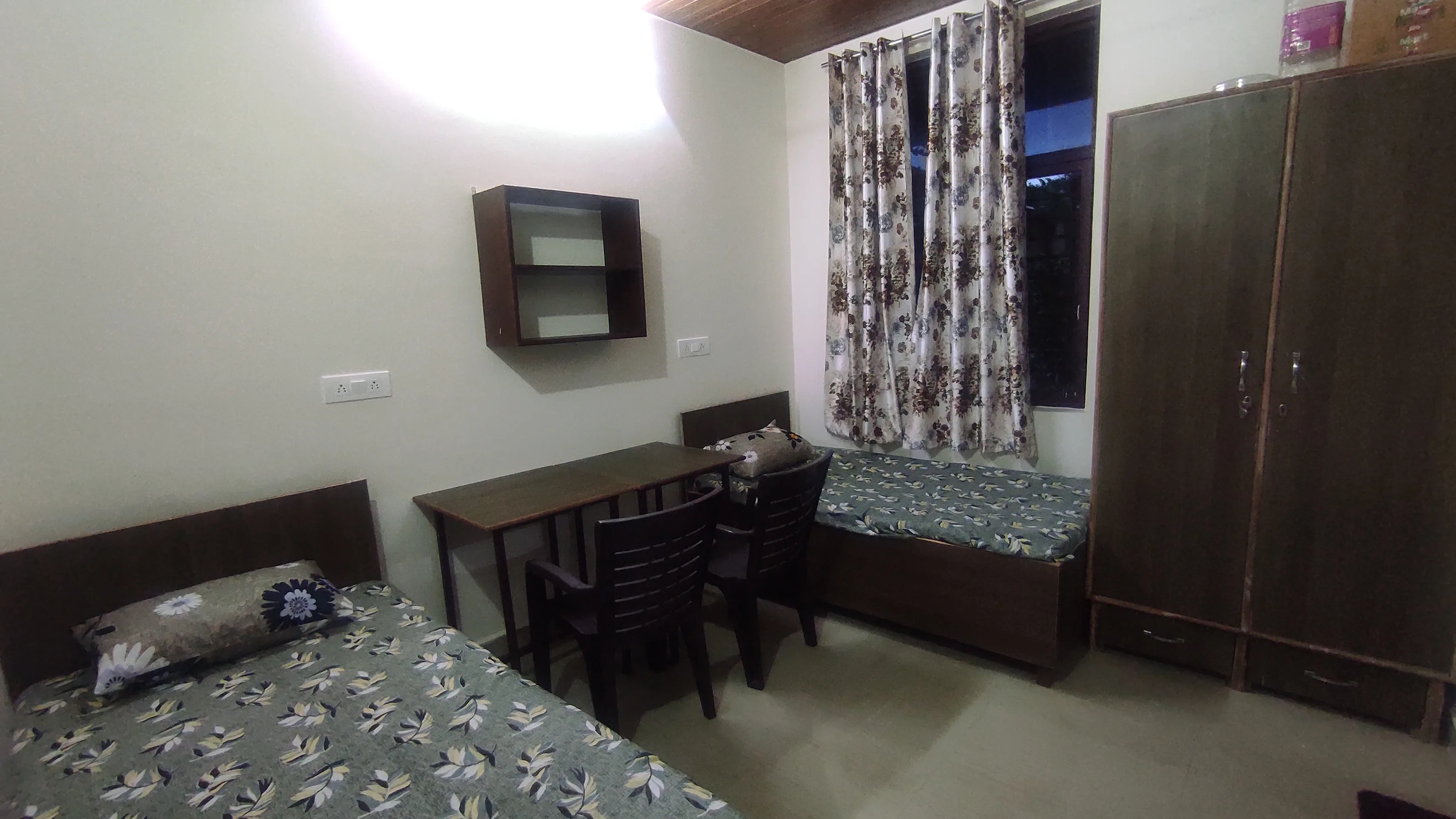 Deluxe room with premium amenities at Daksh Home hostel near UPES Dehradun
